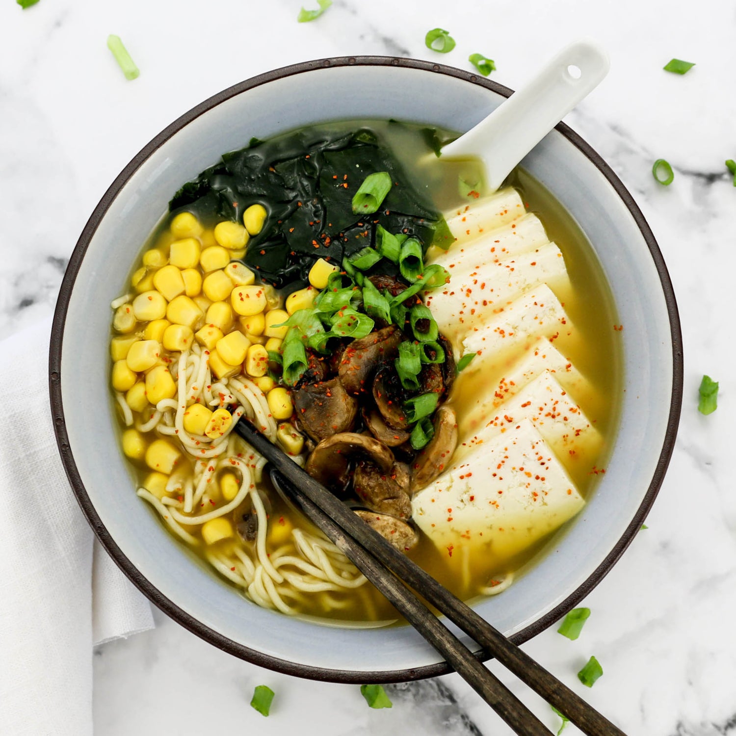 Vegan bouillon and seasonings transforming plant-based dishes with rich, savory flavors